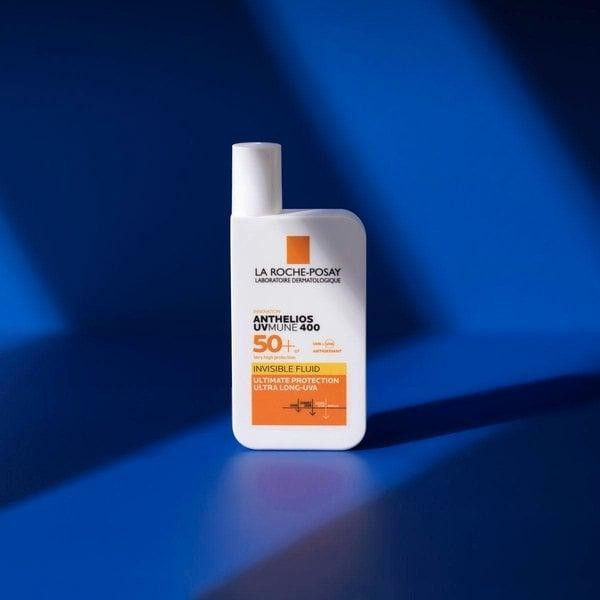 فلوئید ضد آفتاب بی‌رنگ لاروش پوزای +SPF50 مدل Anthelios UVMune 400 مناسب انواع پوست حجم 50 میلی‌لیتر